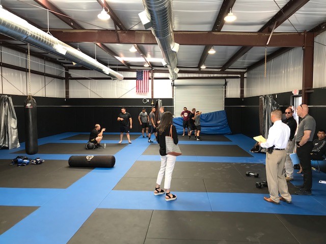 Attendees inside a training facility