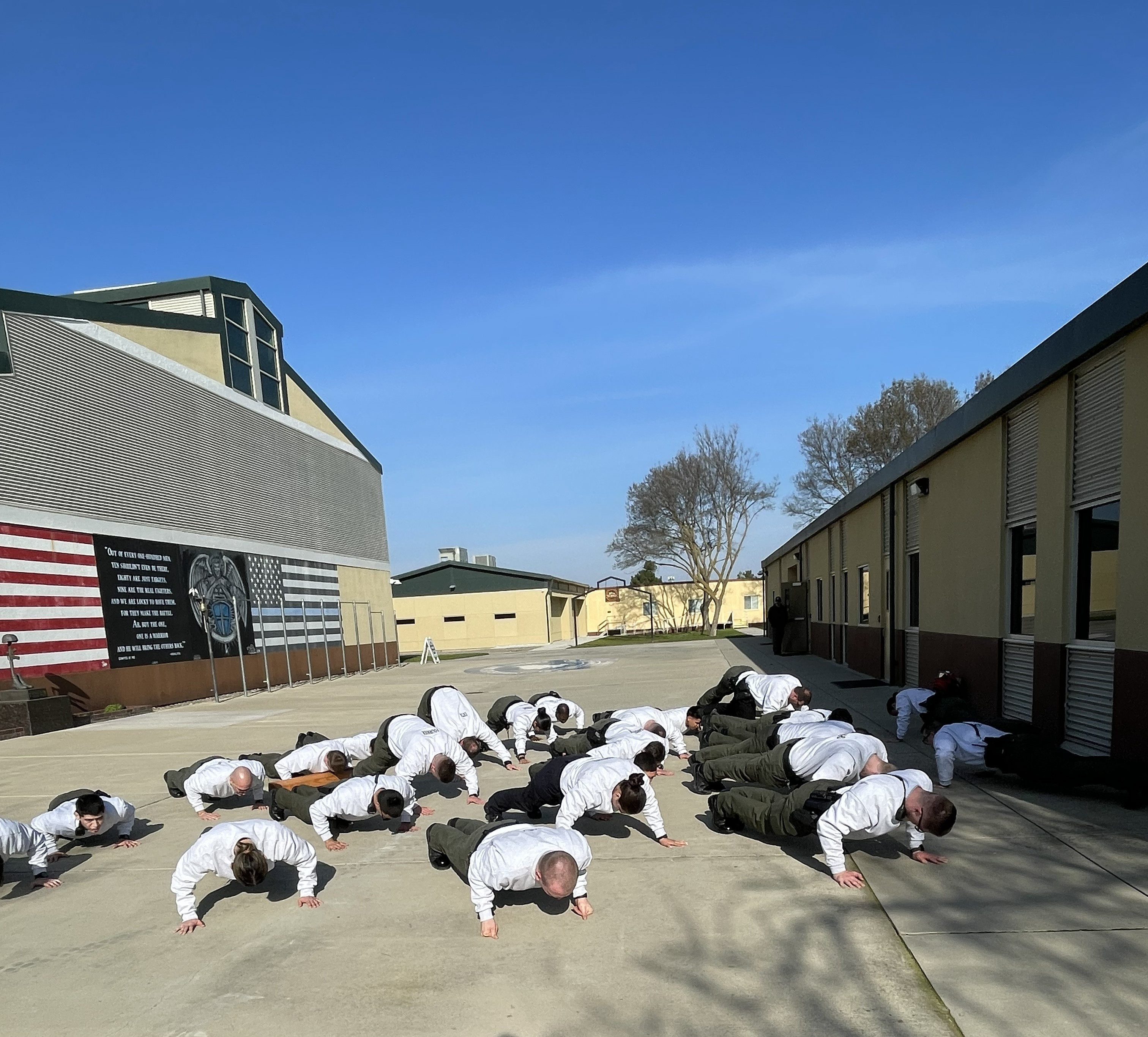 Students at the Stanislaus County Sheriff’s Office Regional Training Center Regular Basic Course participate in a physical training session