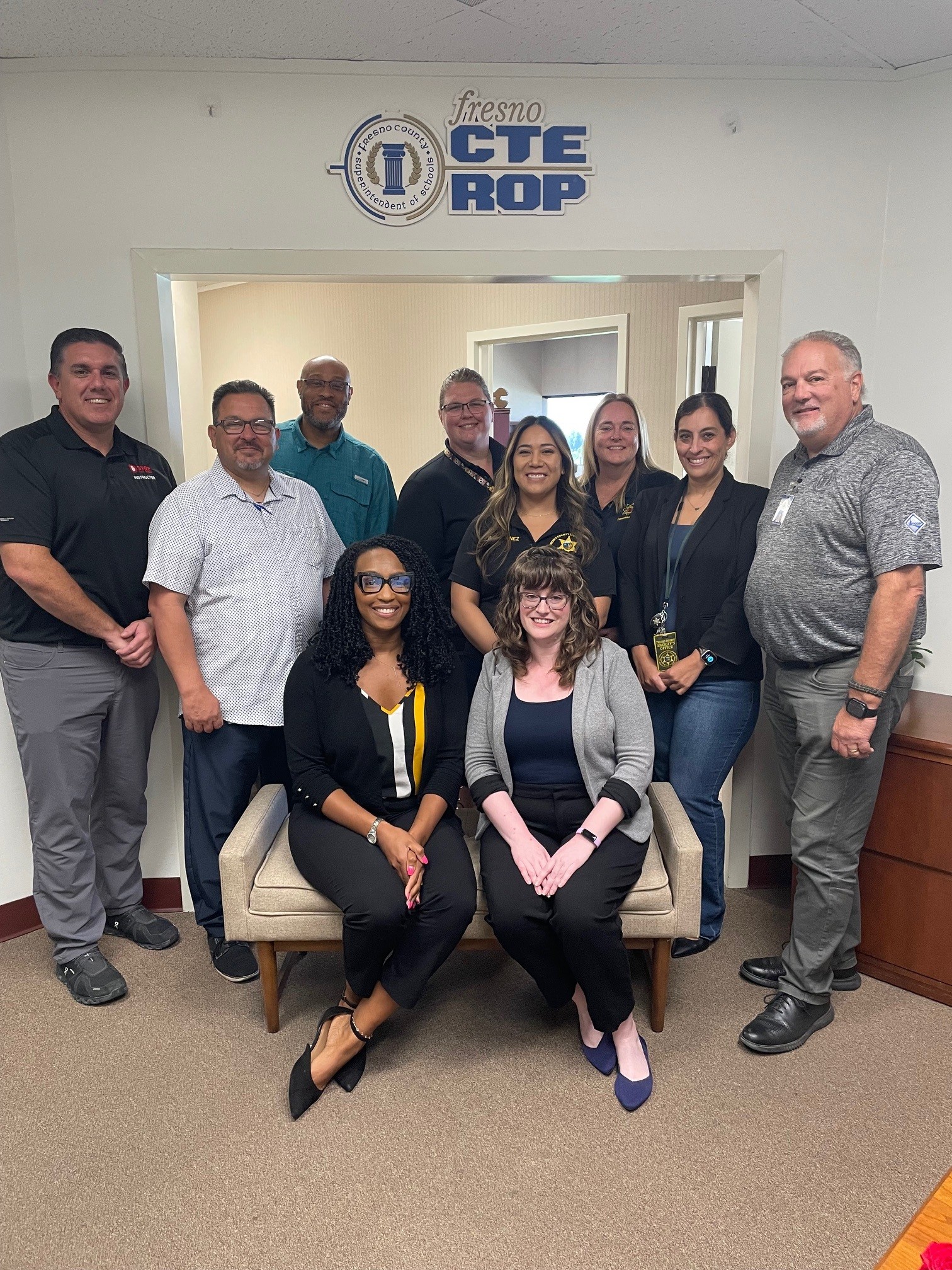 POST staff Jamila Fields and Michelle Daubner posing with members of the Fresno ROP.