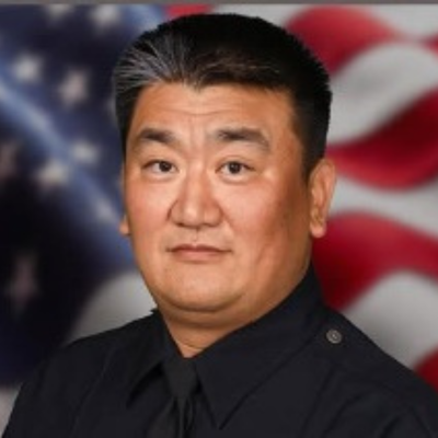 Police Sergeant  Shiou Deng